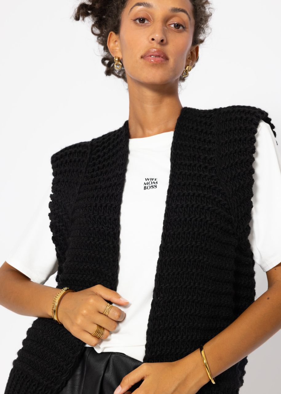 Sleeveless knitted vest with structured shoulders in black