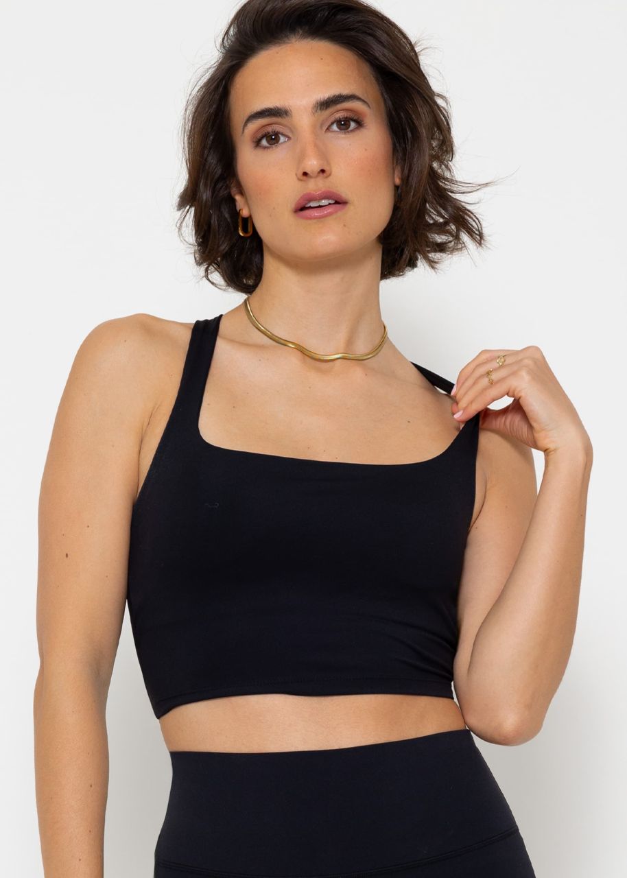 Sports bra with crossed, wide straps - black