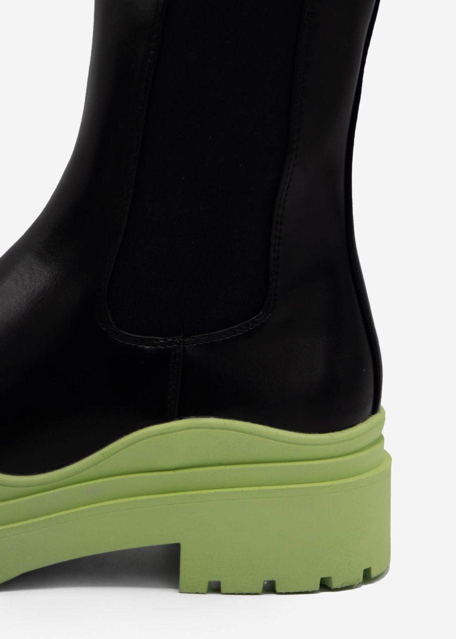 Combat boots with green sole, black