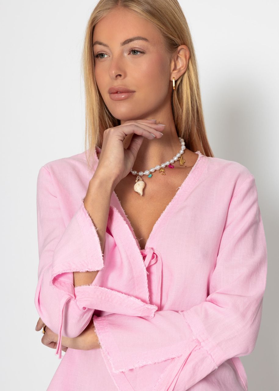 Linen blouse with trumpet sleeves and bow closure - pink