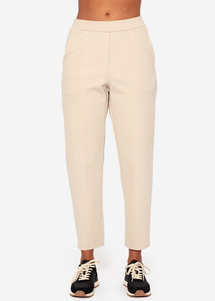 Jersey chinos with decorative stitching - beige