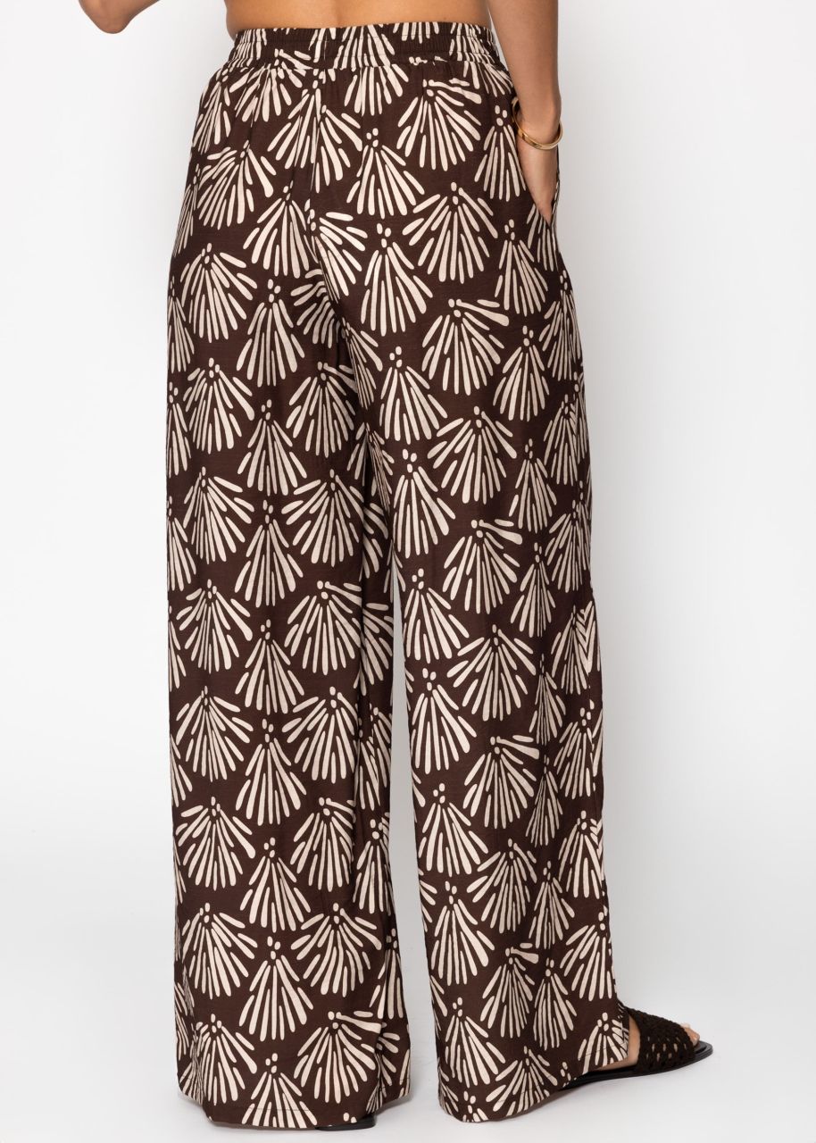 Slip-on trousers with shell print - brown