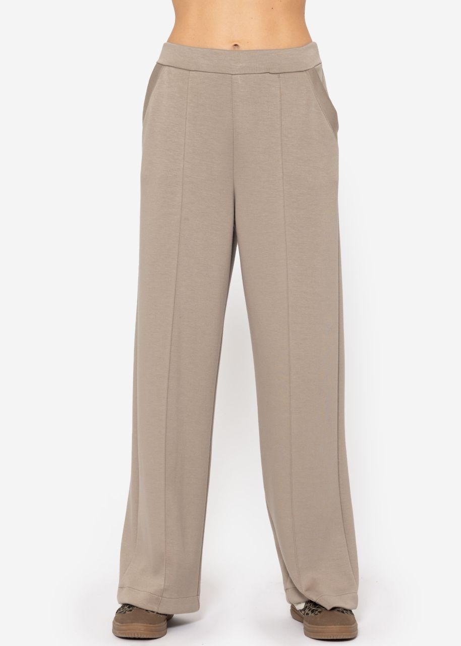 Soft, wide jogging trousers with piping - taupe