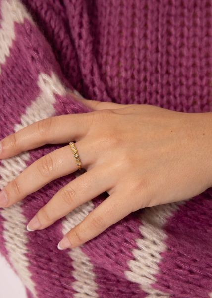 Delicate ring with sparkling stones, gold
