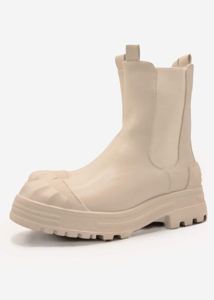 Combat boots with accentuated cap, beige