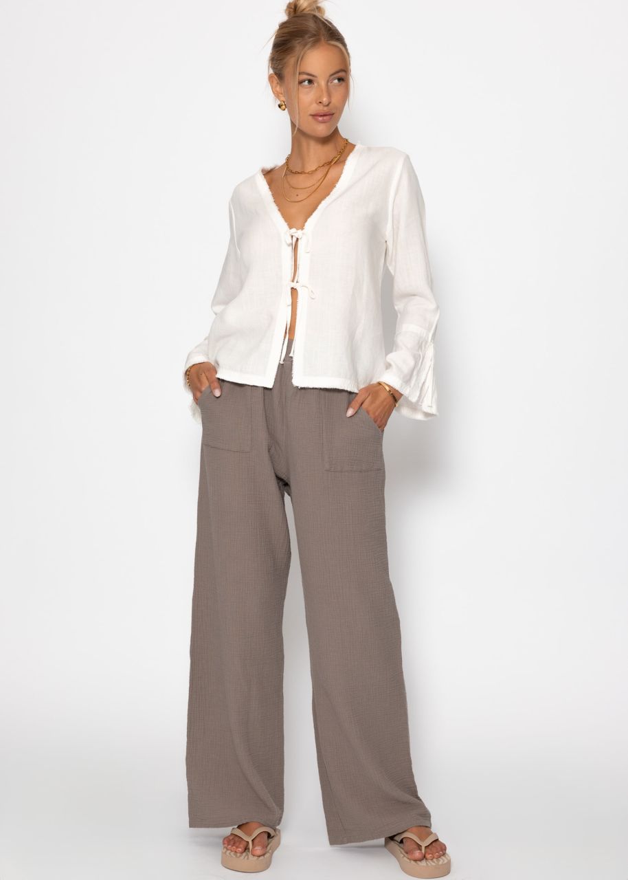 Linen blouse with trumpet sleeves and bow fastening - white