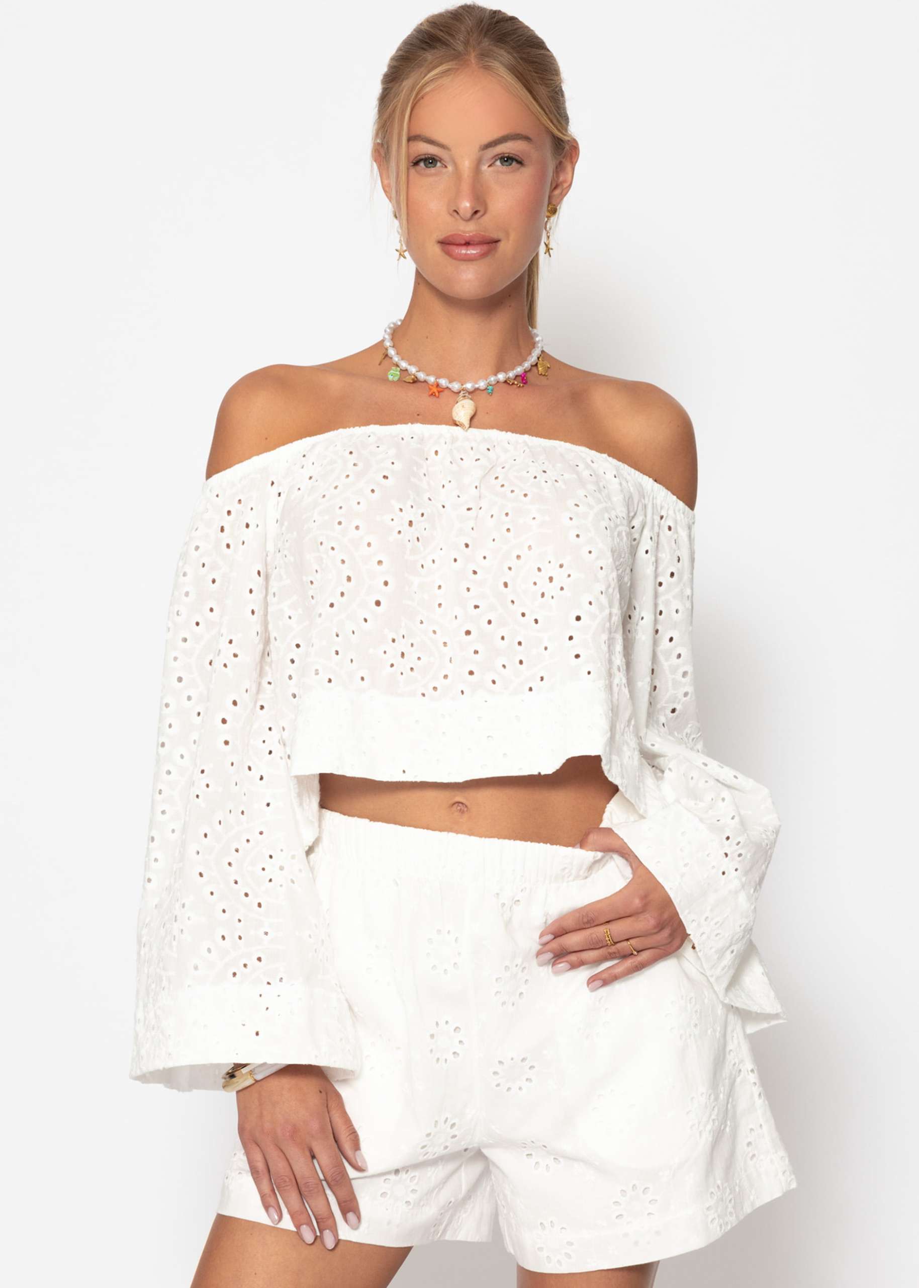 Off-the-shoulder long-sleeved top with eyelet embroidery - white