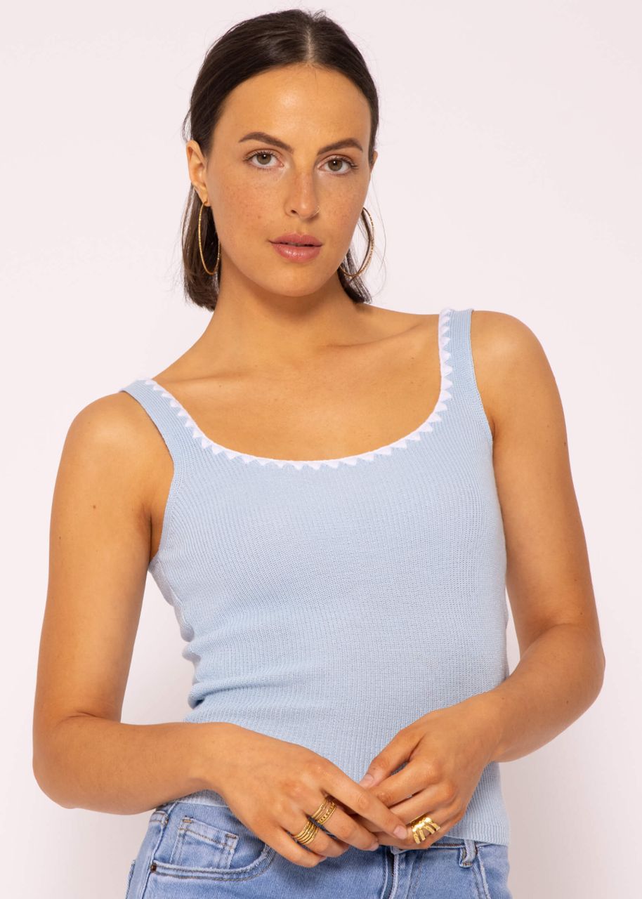 Knitted top with border, light blue