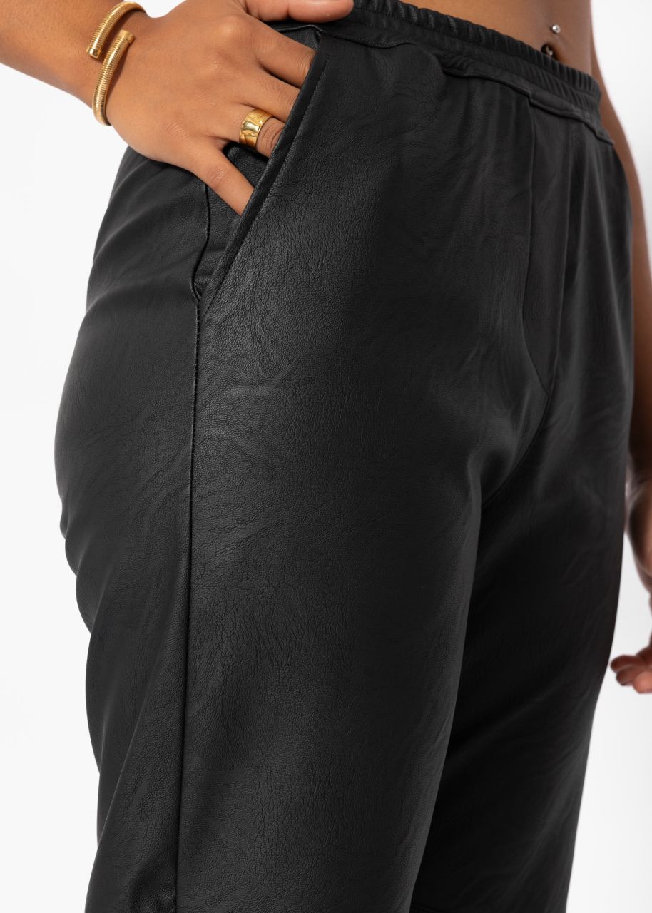 Synthetic leather trousers - black