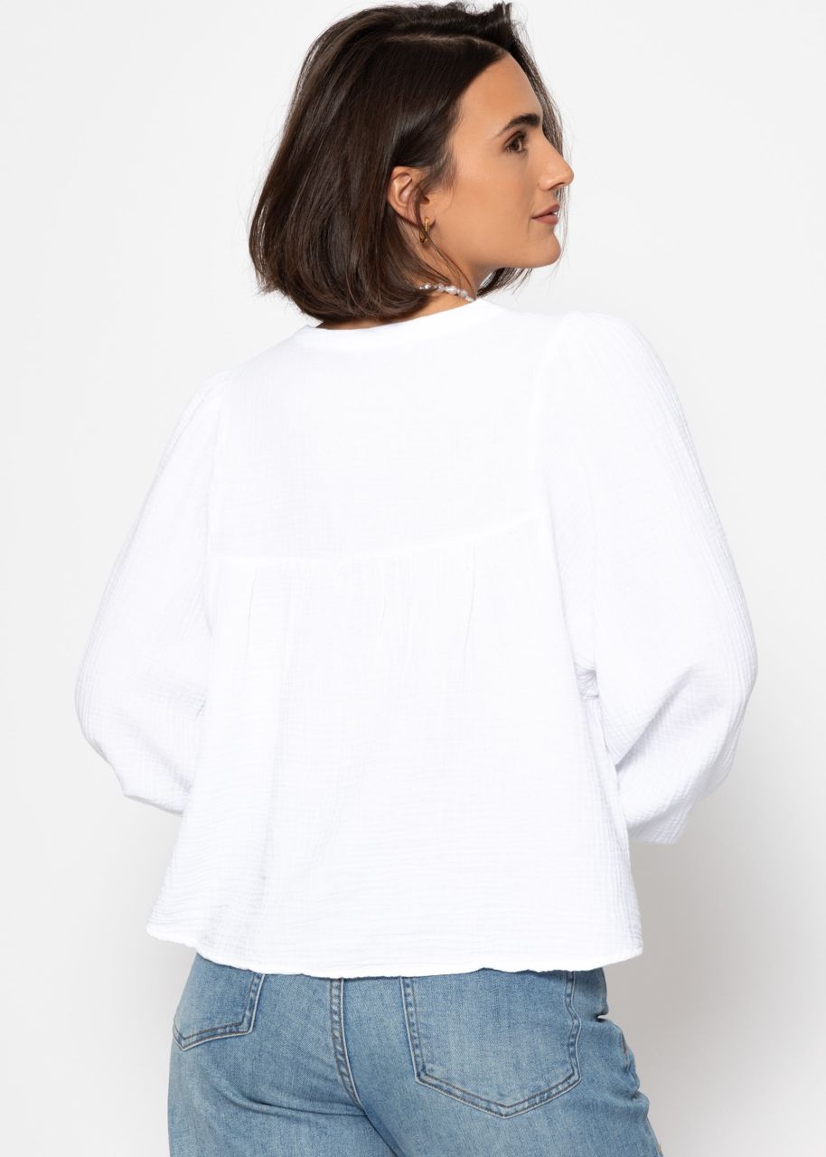 Muslin blouse with V-neck and fringes - white