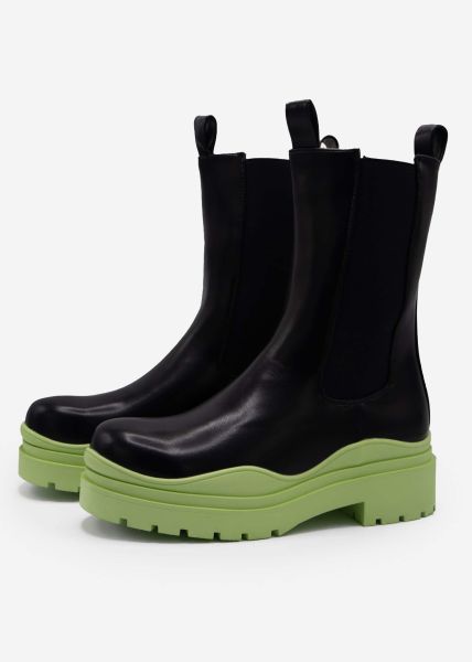 Combat boots with green sole, black