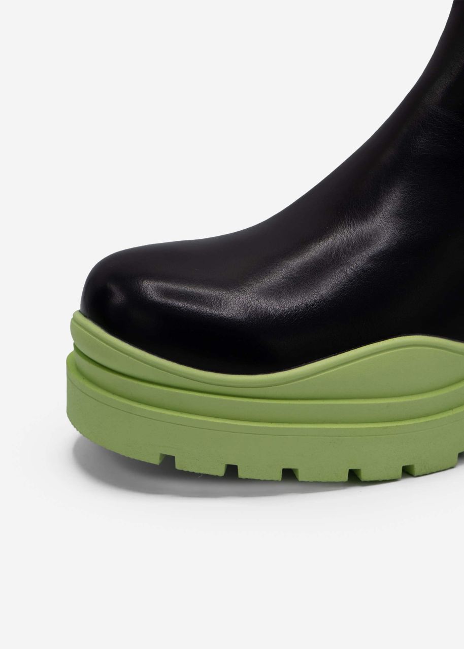 Combat boots with green sole, black