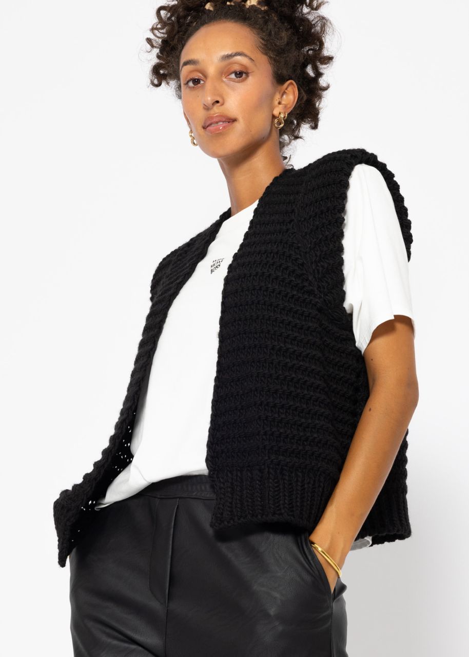 Sleeveless knitted vest with structured shoulders in black