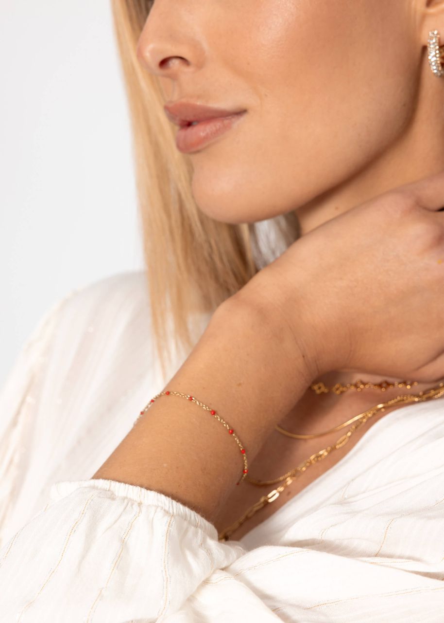 Bracelet with red beads - gold