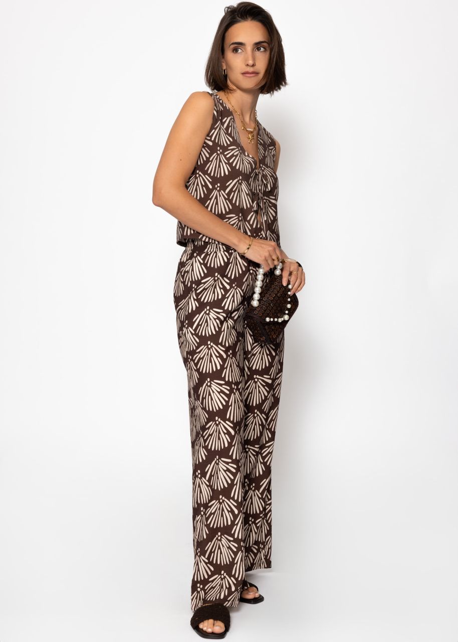 Slip-on trousers with shell print - brown