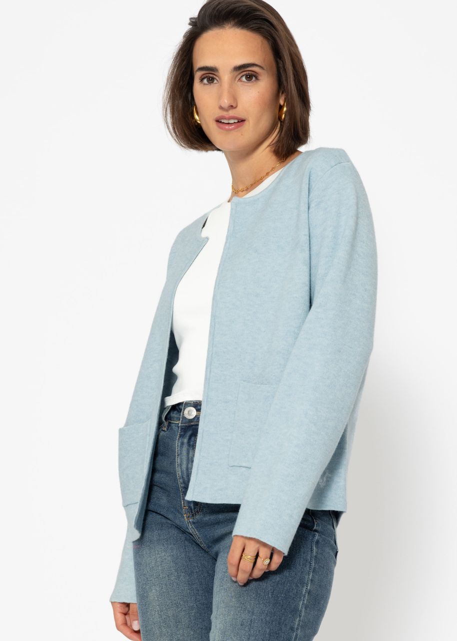 Cardigan with a round neckline and patch pockets - light blue