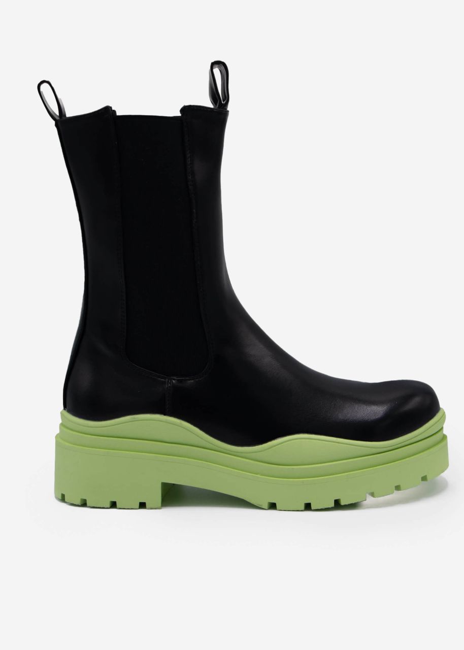 Combat boots with green sole, black