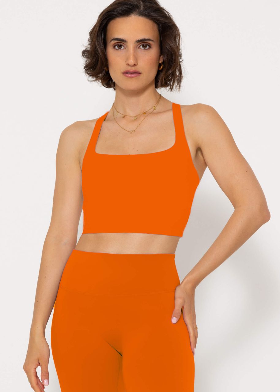 Sports bra with crossed, wide straps - orange