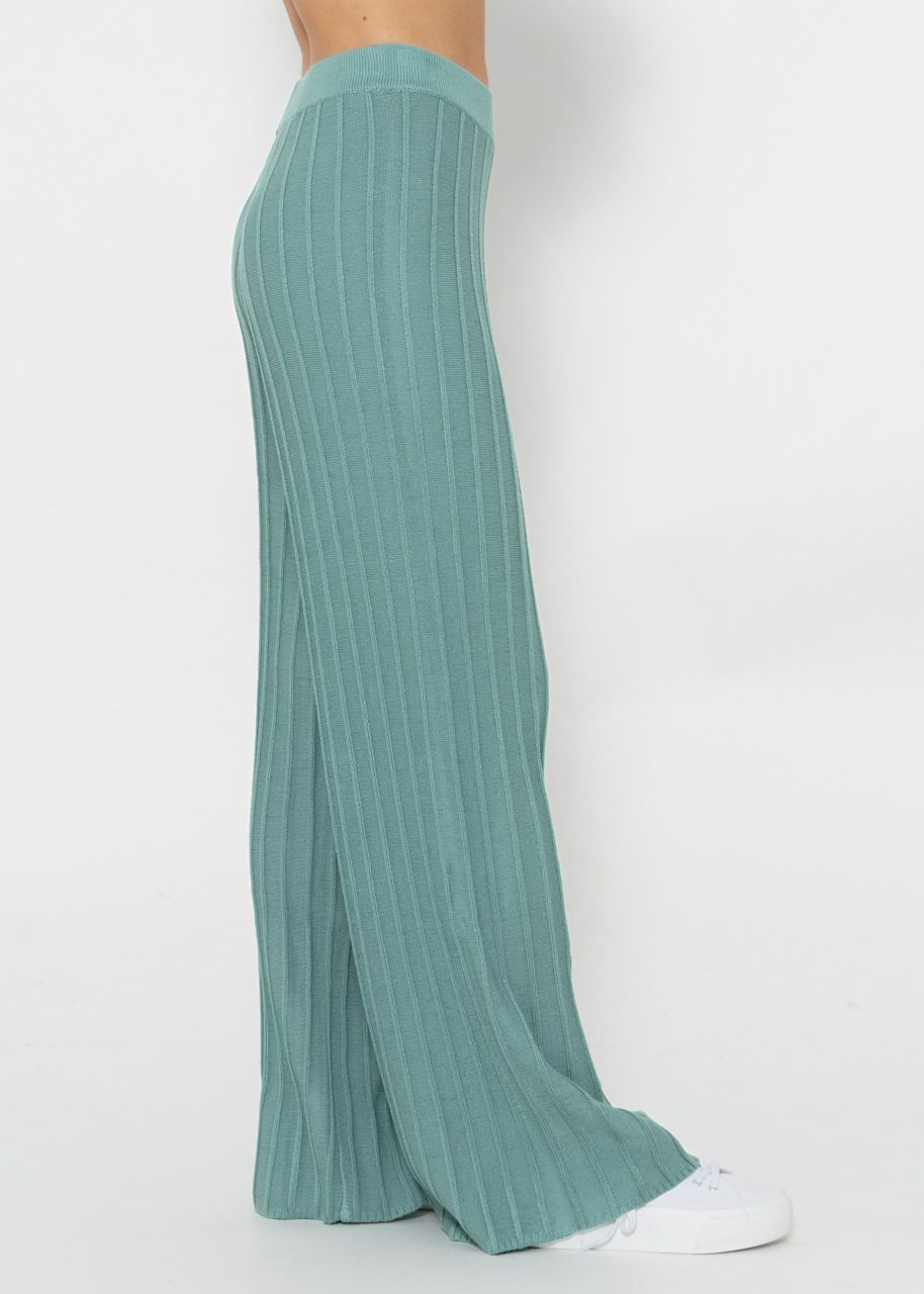 Flowing knitted trousers with ribbed structure - green