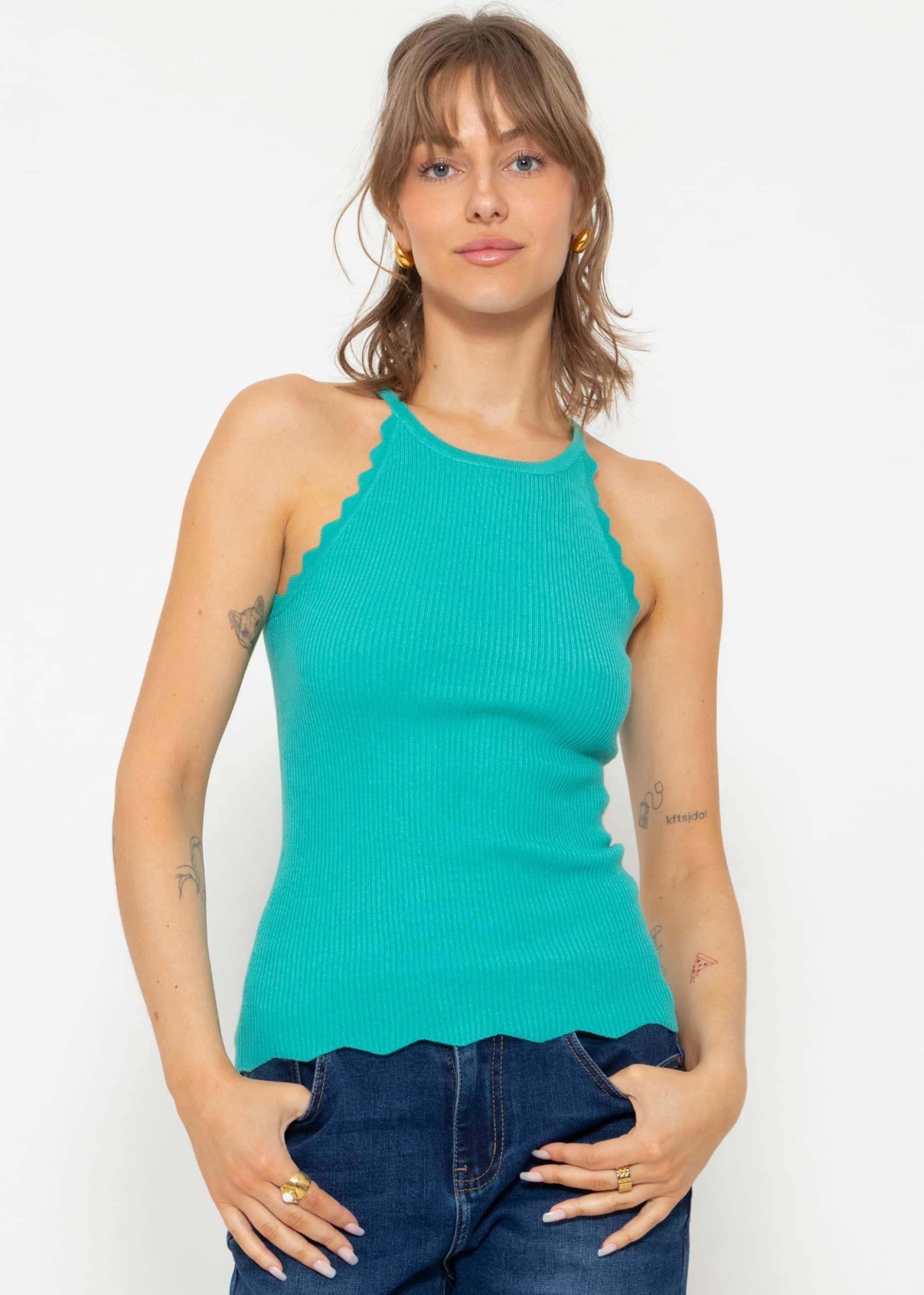 Knit top with scalloped edge, turquoise