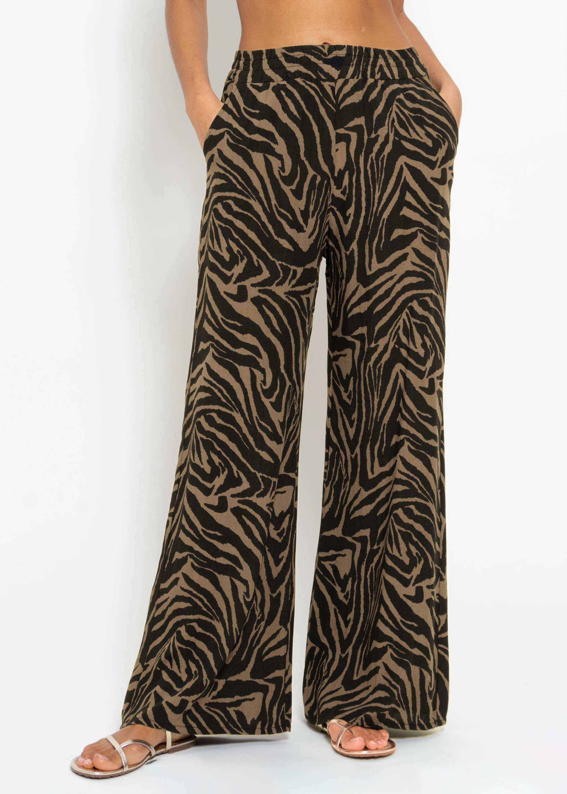 Viscose slip-on trousers with zebra print - black-brown