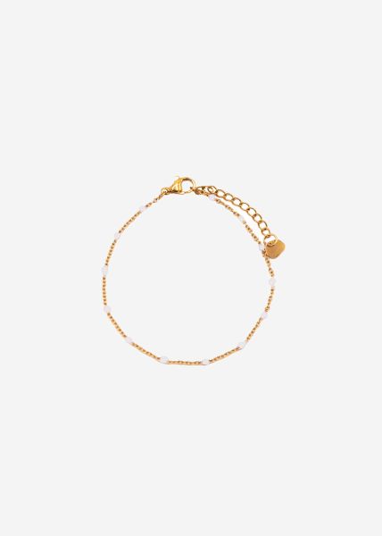 Bracelet with white pearls - gold