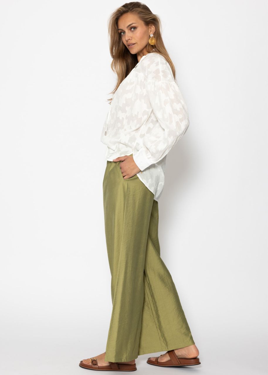 Slightly transparent jacquard blouse with tie detail